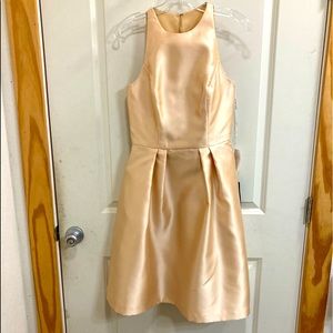 Gold cocktail dress the size run small.